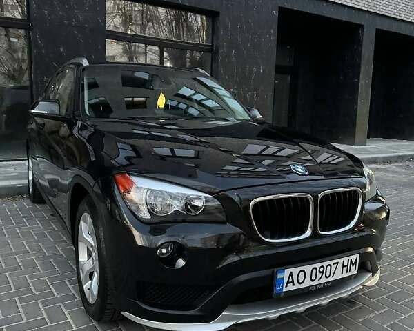 Чорний БМВ Х1, об'ємом двигуна 2 л та пробігом 102 тис. км за 13999 $, фото 1 на Automoto.ua