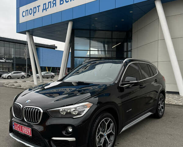 Чорний БМВ Х1, об'ємом двигуна 2 л та пробігом 104 тис. км за 15800 $, фото 1 на Automoto.ua