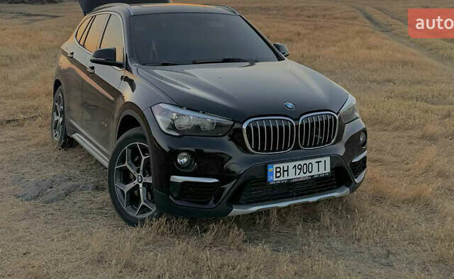 Черный БМВ Х1, объемом двигателя 2 л и пробегом 130 тыс. км за 18500 $, фото 1 на Automoto.ua