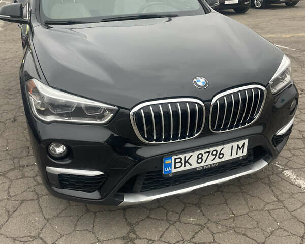 Черный БМВ Х1, объемом двигателя 2 л и пробегом 150 тыс. км за 14900 $, фото 1 на Automoto.ua
