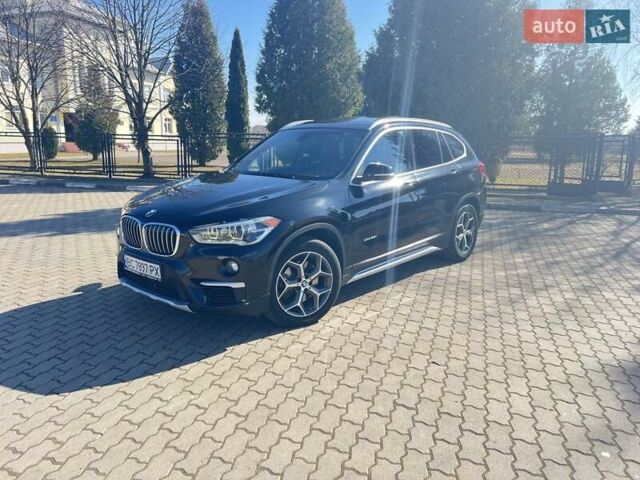 Черный БМВ Х1, объемом двигателя 2 л и пробегом 127 тыс. км за 18700 $, фото 1 на Automoto.ua