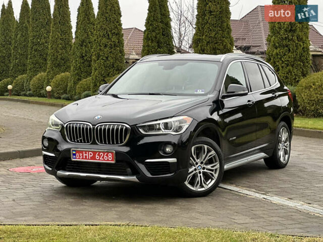 Черный БМВ Х1, объемом двигателя 2 л и пробегом 103 тыс. км за 17300 $, фото 1 на Automoto.ua