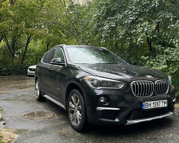 Черный БМВ Х1, объемом двигателя 2 л и пробегом 107 тыс. км за 21500 $, фото 1 на Automoto.ua