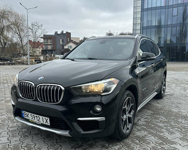 Черный БМВ Х1, объемом двигателя 2 л и пробегом 115 тыс. км за 17850 $, фото 1 на Automoto.ua