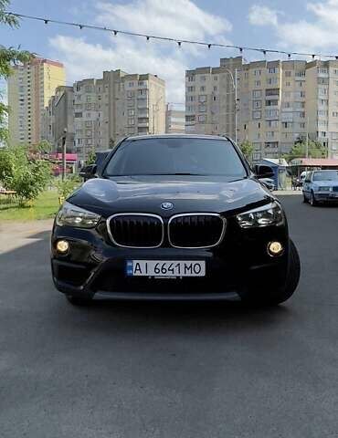 Черный БМВ Х1, объемом двигателя 1.5 л и пробегом 107 тыс. км за 16000 $, фото 1 на Automoto.ua