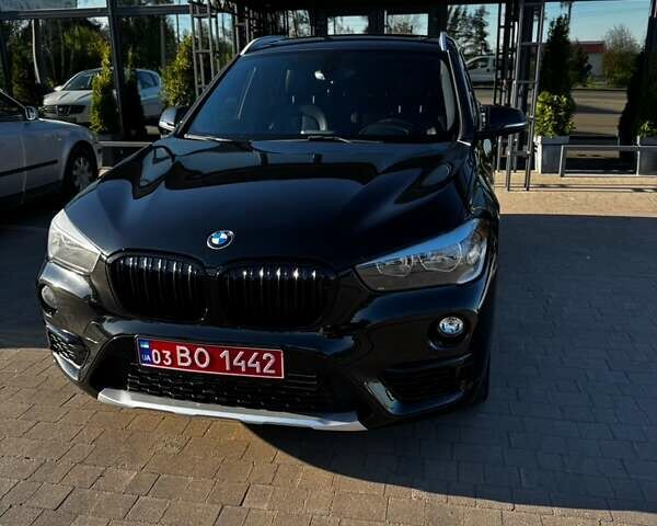 Чорний БМВ Х1, об'ємом двигуна 2 л та пробігом 128 тис. км за 16500 $, фото 1 на Automoto.ua