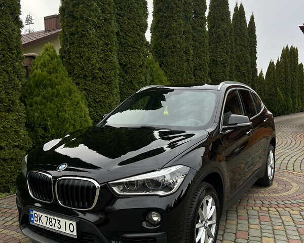 Черный БМВ Х1, объемом двигателя 2 л и пробегом 183 тыс. км за 26900 $, фото 1 на Automoto.ua
