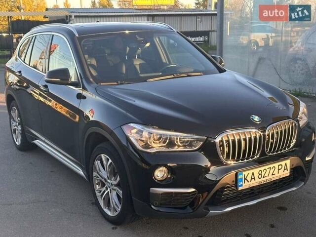 Черный БМВ Х1, объемом двигателя 2 л и пробегом 125 тыс. км за 22500 $, фото 1 на Automoto.ua