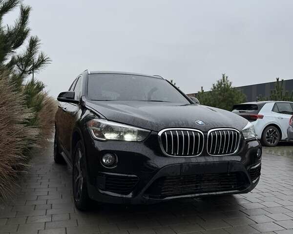 Чорний БМВ Х1, об'ємом двигуна 2 л та пробігом 100 тис. км за 23500 $, фото 1 на Automoto.ua