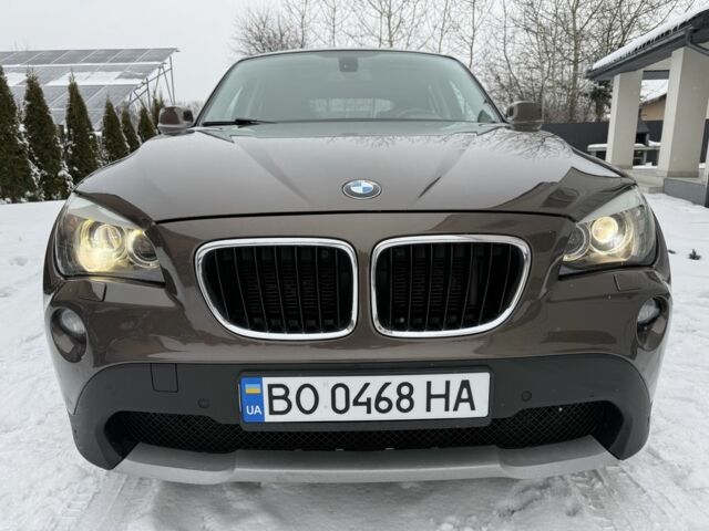 Коричневый БМВ Х1, объемом двигателя 2 л и пробегом 215 тыс. км за 11900 $, фото 1 на Automoto.ua