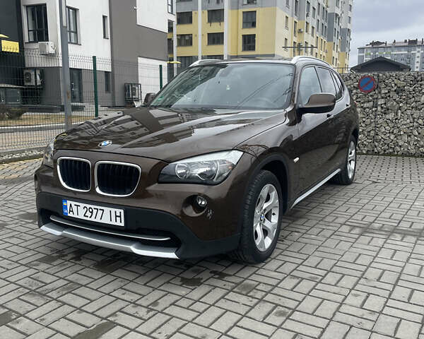 Коричневий БМВ Х1, об'ємом двигуна 2 л та пробігом 187 тис. км за 11444 $, фото 1 на Automoto.ua
