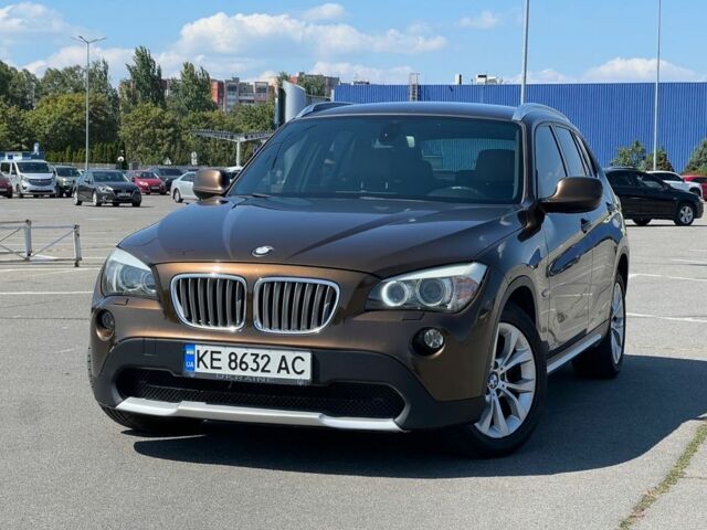 Коричневый БМВ Х1, объемом двигателя 2 л и пробегом 242 тыс. км за 11000 $, фото 1 на Automoto.ua