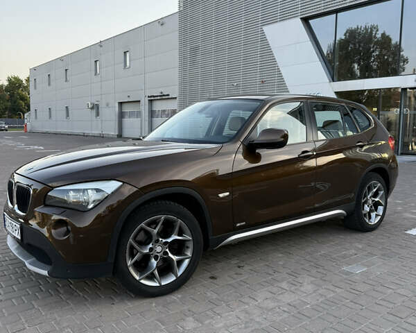 Коричневый БМВ Х1, объемом двигателя 2 л и пробегом 138 тыс. км за 13699 $, фото 1 на Automoto.ua