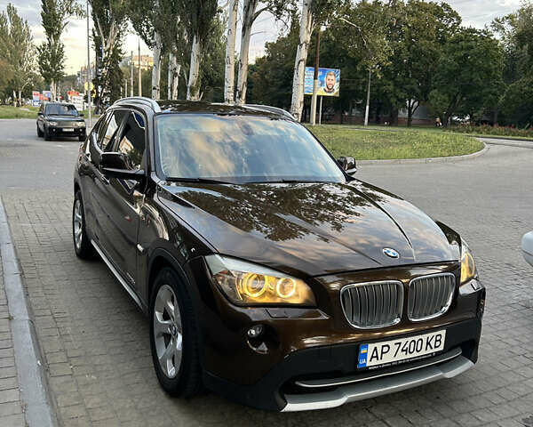 Коричневый БМВ Х1, объемом двигателя 2 л и пробегом 327 тыс. км за 10800 $, фото 1 на Automoto.ua