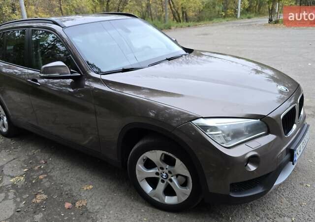 Коричневый БМВ Х1, объемом двигателя 2 л и пробегом 262 тыс. км за 12600 $, фото 1 на Automoto.ua