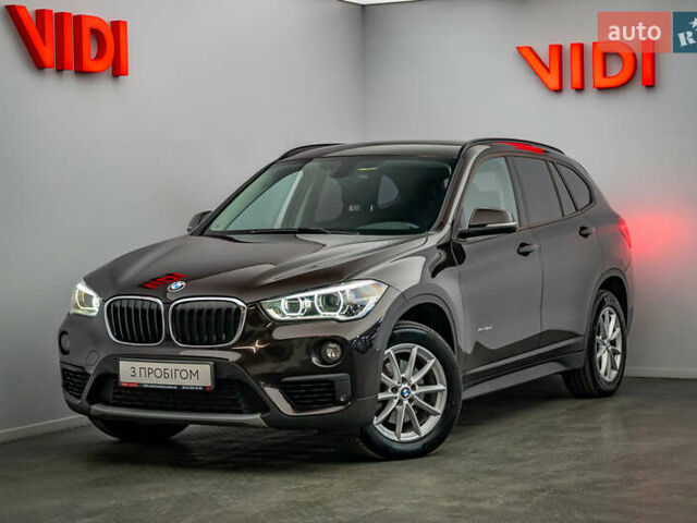 Коричневый БМВ Х1, объемом двигателя 2 л и пробегом 129 тыс. км за 23685 $, фото 1 на Automoto.ua