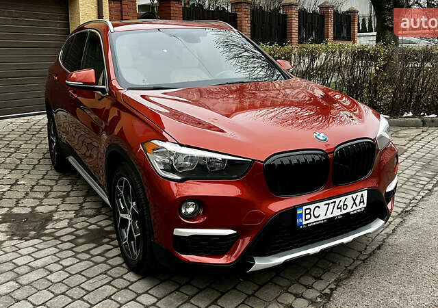 Красный БМВ Х1, объемом двигателя 2 л и пробегом 84 тыс. км за 17800 $, фото 1 на Automoto.ua