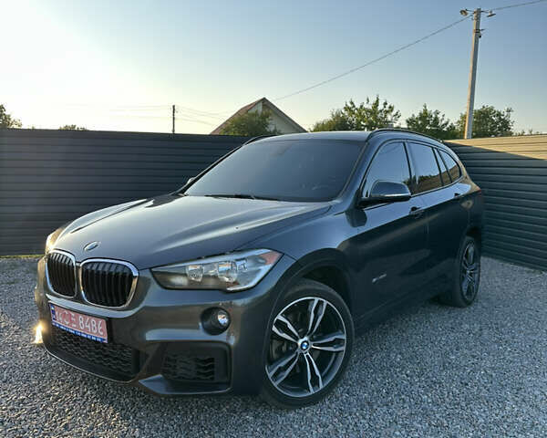 Серый БМВ Х1, объемом двигателя 2 л и пробегом 99 тыс. км за 18650 $, фото 1 на Automoto.ua