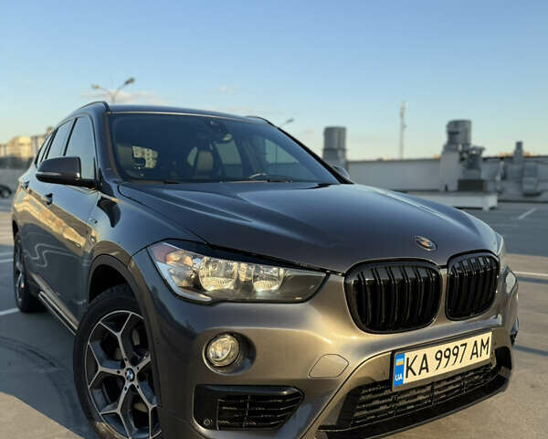 Серый БМВ Х1, объемом двигателя 2 л и пробегом 52 тыс. км за 28000 $, фото 1 на Automoto.ua