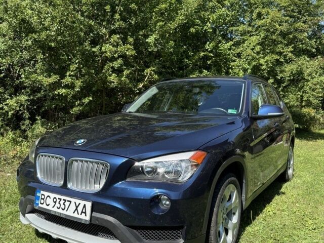 Синій БМВ Х1, об'ємом двигуна 2 л та пробігом 104 тис. км за 13192 $, фото 1 на Automoto.ua