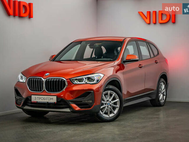 Оранжевый БМВ Х1, объемом двигателя 1.5 л и пробегом 70 тыс. км за 27324 $, фото 1 на Automoto.ua