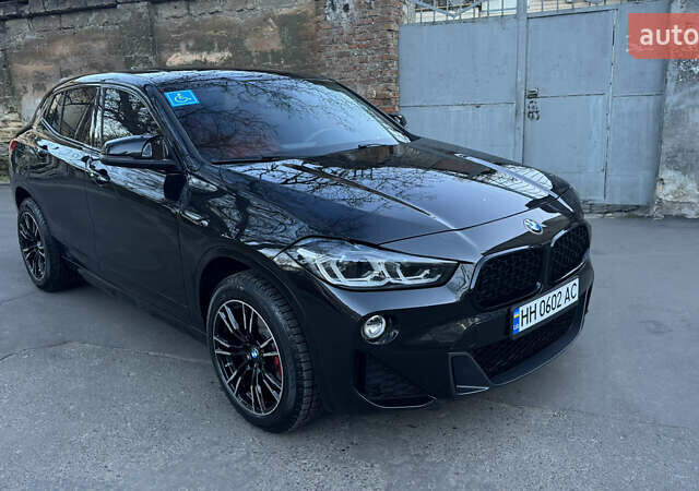 Черный БМВ X2, объемом двигателя 2 л и пробегом 85 тыс. км за 23500 $, фото 1 на Automoto.ua