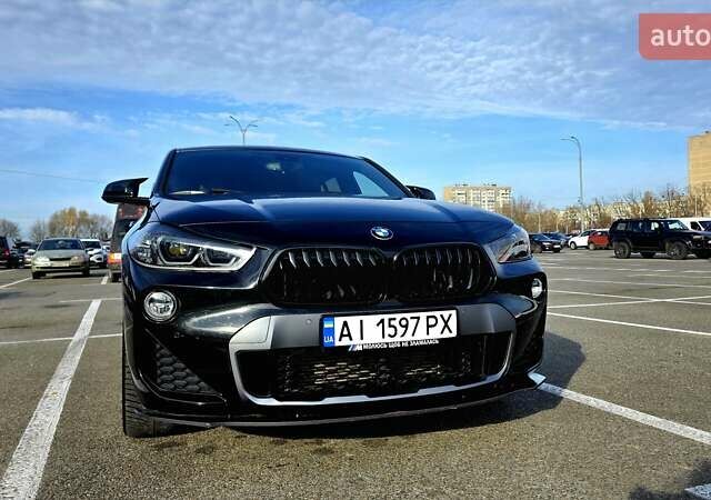 Черный БМВ X2, объемом двигателя 2 л и пробегом 102 тыс. км за 21900 $, фото 1 на Automoto.ua