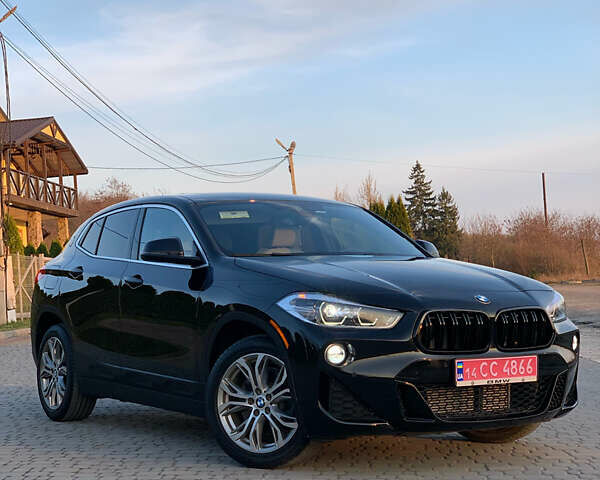 Черный БМВ X2, объемом двигателя 2 л и пробегом 135 тыс. км за 22499 $, фото 1 на Automoto.ua