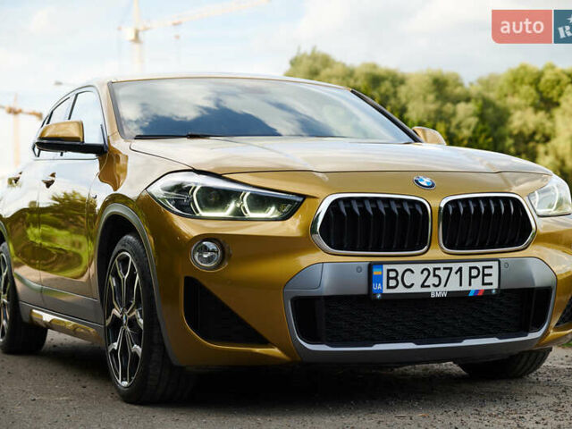 Желтый БМВ X2, объемом двигателя 2 л и пробегом 66 тыс. км за 33500 $, фото 1 на Automoto.ua