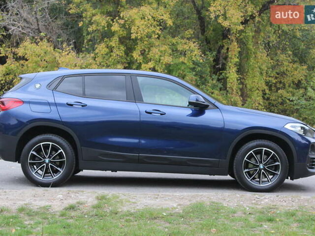Синий БМВ X2, объемом двигателя 2 л и пробегом 165 тыс. км за 25999 $, фото 1 на Automoto.ua