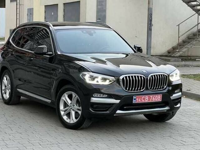 Чорний БМВ Х3, об'ємом двигуна 2 л та пробігом 131 тис. км за 21400 $, фото 1 на Automoto.ua