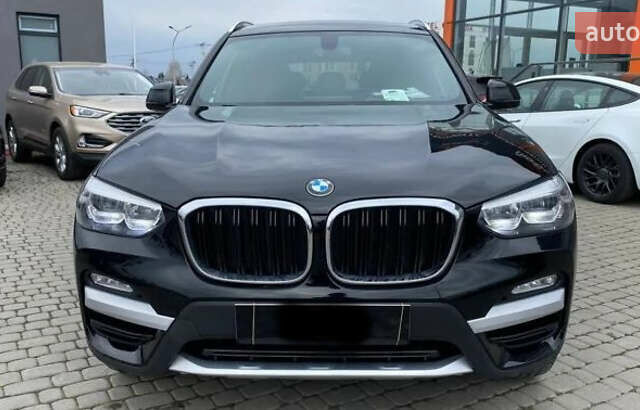 Чорний БМВ Х3, об'ємом двигуна 2 л та пробігом 157 тис. км за 26499 $, фото 1 на Automoto.ua