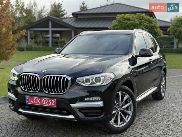 Чорний БМВ Х3, об'ємом двигуна 2 л та пробігом 121 тис. км за 27700 $, фото 1 на Automoto.ua