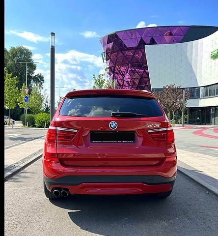 Красный БМВ Х3, объемом двигателя 2 л и пробегом 150 тыс. км за 19500 $, фото 1 на Automoto.ua