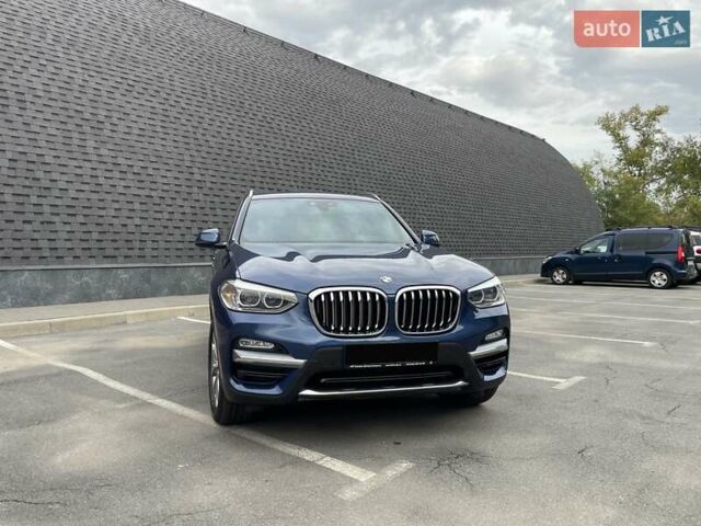 Синій БМВ Х3, об'ємом двигуна 2 л та пробігом 70 тис. км за 32300 $, фото 1 на Automoto.ua
