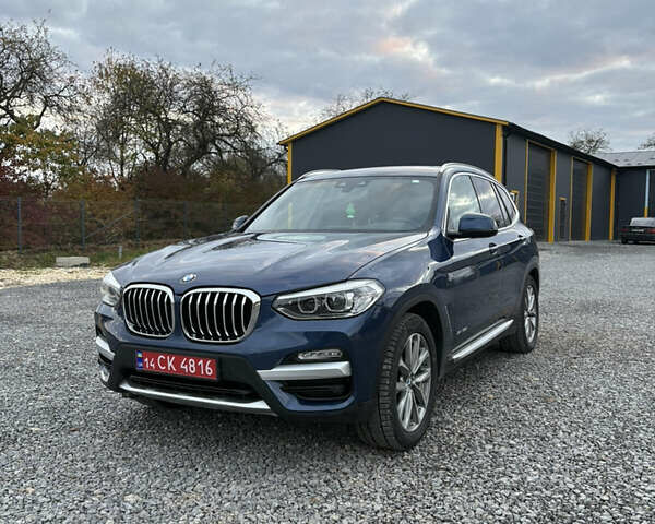 Синий БМВ Х3, объемом двигателя 2 л и пробегом 140 тыс. км за 29900 $, фото 1 на Automoto.ua