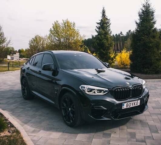 Черный БМВ X4 M, объемом двигателя 3 л и пробегом 75 тыс. км за 59999 $, фото 1 на Automoto.ua