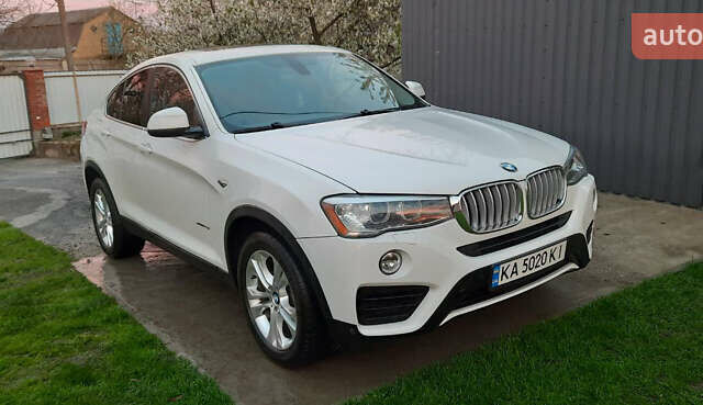 Белый БМВ Х4, объемом двигателя 2 л и пробегом 165 тыс. км за 26500 $, фото 1 на Automoto.ua