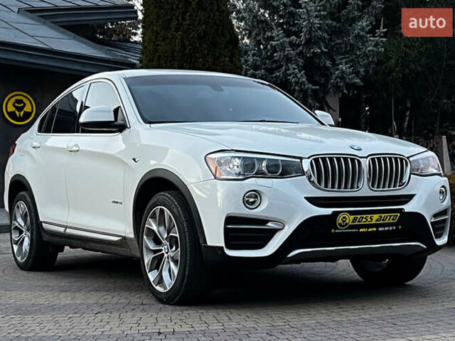Белый БМВ Х4, объемом двигателя 2 л и пробегом 95 тыс. км за 19750 $, фото 1 на Automoto.ua