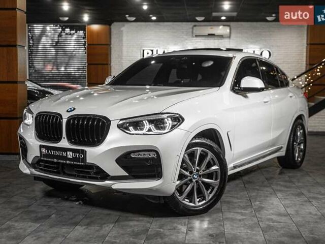 Белый БМВ Х4, объемом двигателя 2 л и пробегом 65 тыс. км за 34500 $, фото 1 на Automoto.ua