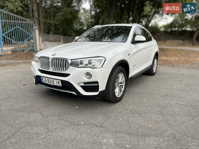 Белый БМВ Х4, объемом двигателя 2 л и пробегом 170 тыс. км за 33800 $, фото 1 на Automoto.ua