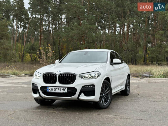 Белый БМВ Х4, объемом двигателя 2 л и пробегом 77 тыс. км за 44800 $, фото 1 на Automoto.ua