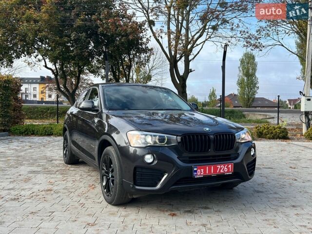 Черный БМВ Х4, объемом двигателя 2 л и пробегом 292 тыс. км за 14800 $, фото 1 на Automoto.ua