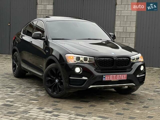 Черный БМВ Х4, объемом двигателя 3 л и пробегом 220 тыс. км за 17700 $, фото 1 на Automoto.ua