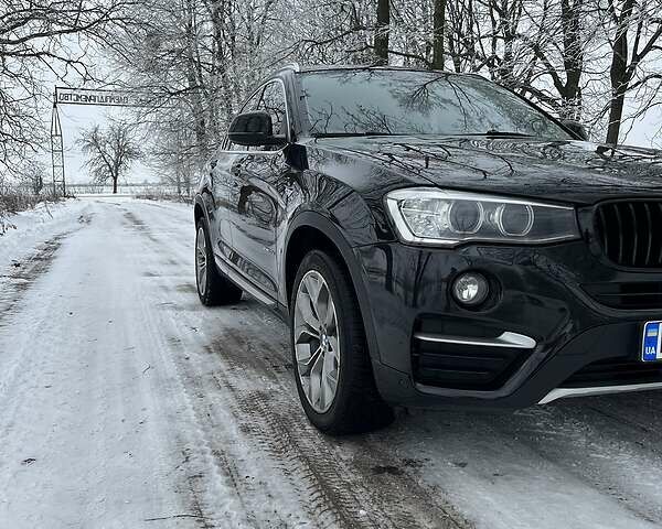 Чорний БМВ Х4, об'ємом двигуна 2 л та пробігом 330 тис. км за 24900 $, фото 1 на Automoto.ua