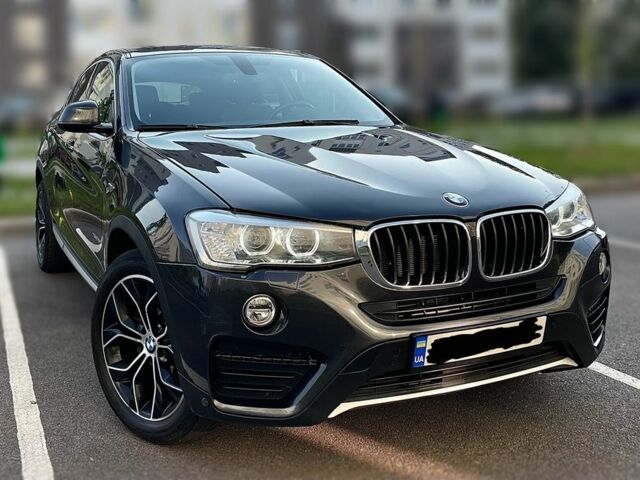 Черный БМВ Х4, объемом двигателя 2 л и пробегом 172 тыс. км за 24800 $, фото 1 на Automoto.ua