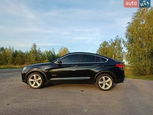 Черный БМВ Х4, объемом двигателя 2 л и пробегом 226 тыс. км за 17200 $, фото 1 на Automoto.ua