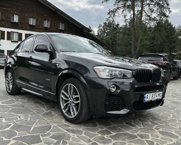 Черный БМВ Х4, объемом двигателя 2 л и пробегом 144 тыс. км за 18900 $, фото 1 на Automoto.ua