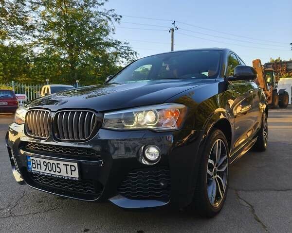 Чорний БМВ Х4, об'ємом двигуна 2 л та пробігом 102 тис. км за 23800 $, фото 1 на Automoto.ua