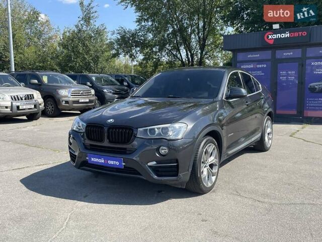 Черный БМВ Х4, объемом двигателя 2 л и пробегом 112 тыс. км за 21900 $, фото 1 на Automoto.ua